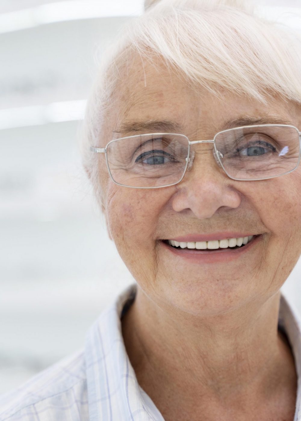 happy-older-woman-wearing-glasses